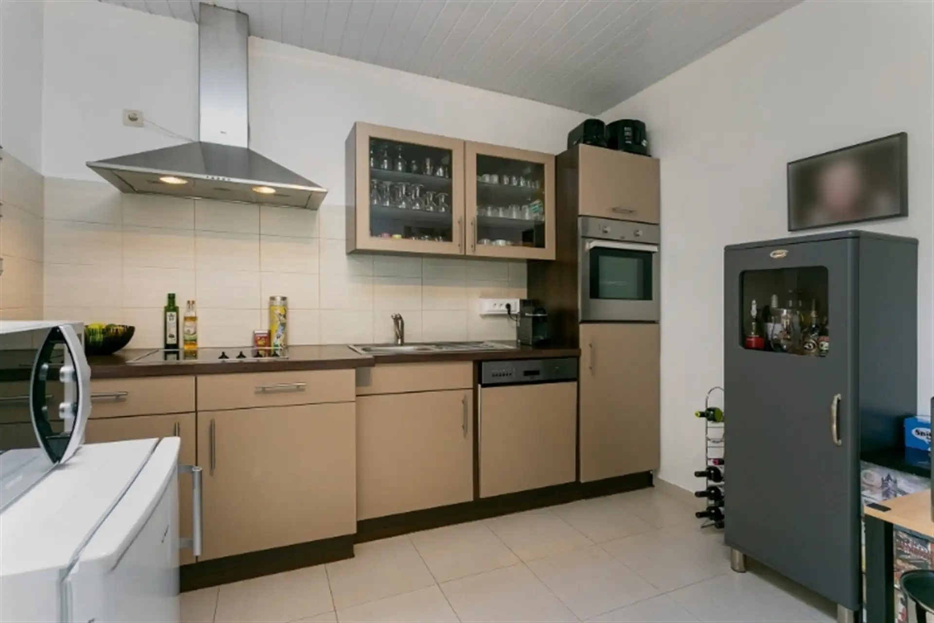 Instapklare woning gelegen op wandelafstand van het centrum en stadspark te Aalst. foto 8