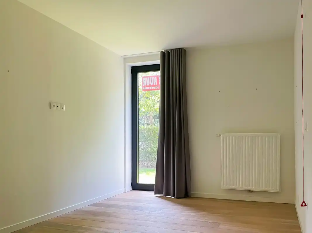 service flat met 1 slaapkamer en tuin + mogelijkheid tot parkeerplaats foto 6