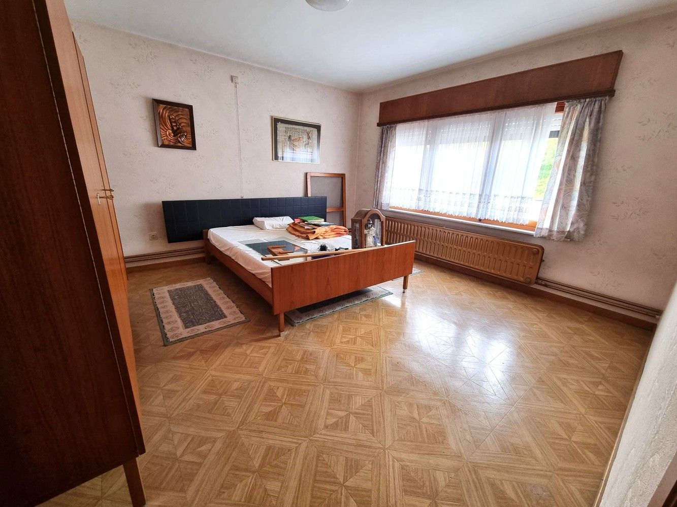 Woning met achterliggend magazijn op een totaal perceel van 19 are 58 ca. foto 12