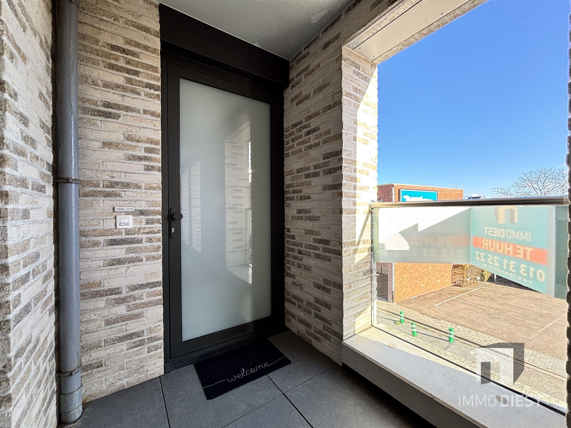 Ruim appartement op de tweede verdieping in het centrum van Tessenderlo foto 2