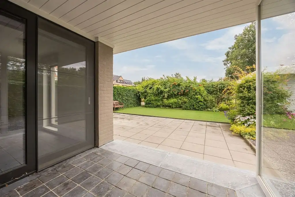 Instapklaar gelijkvloers appartement met tuin foto 16