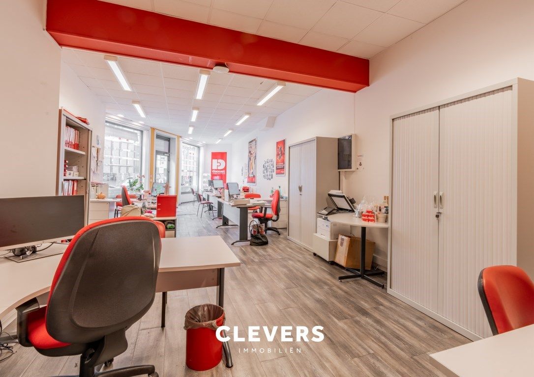 Opbrengsteigendom met lopende handelshuur + 2 appartementen foto 7