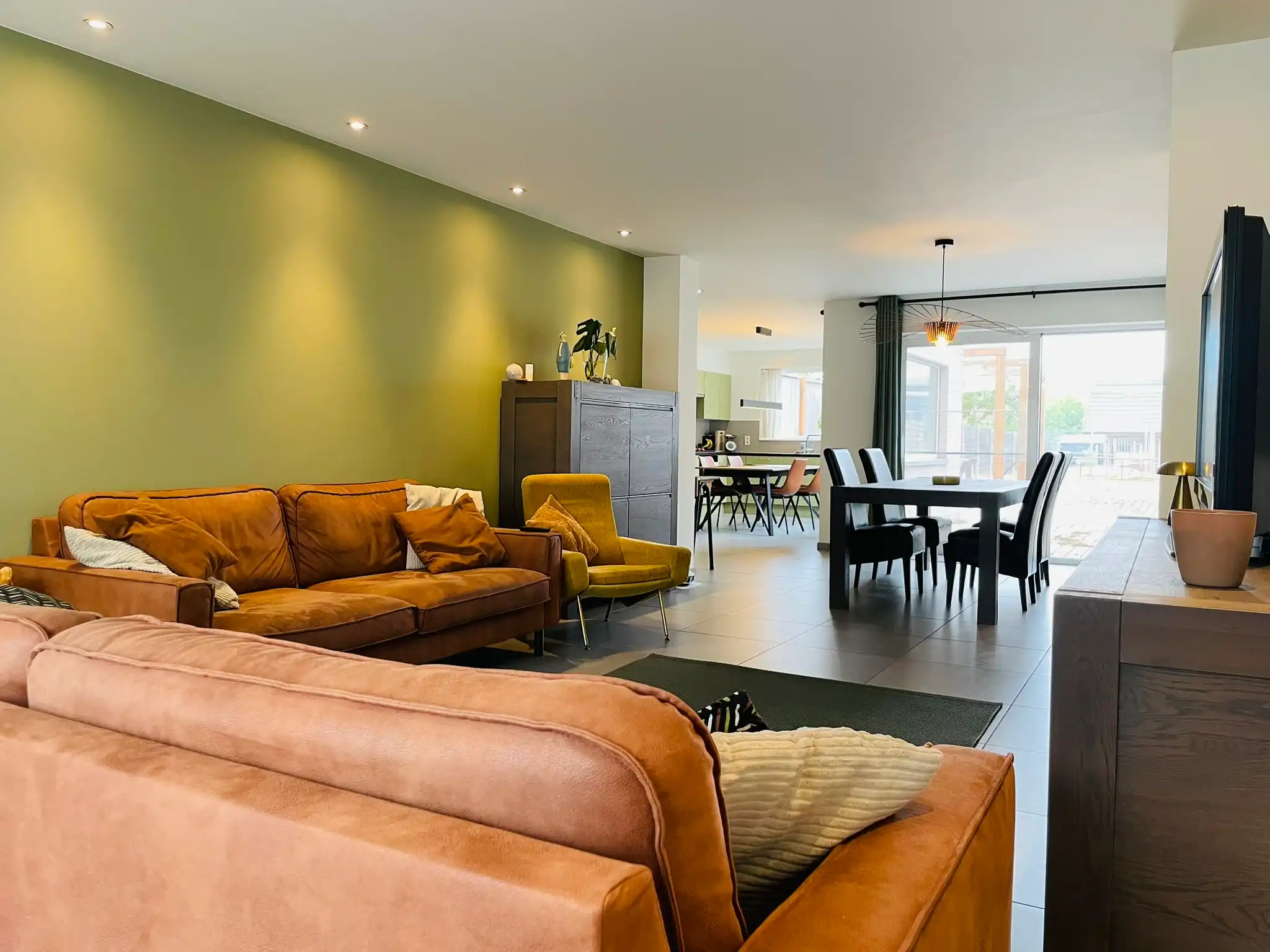 Ruime gezinswoning met grote zuidgerichte tuin, garage en polyvalente ruimte foto 4