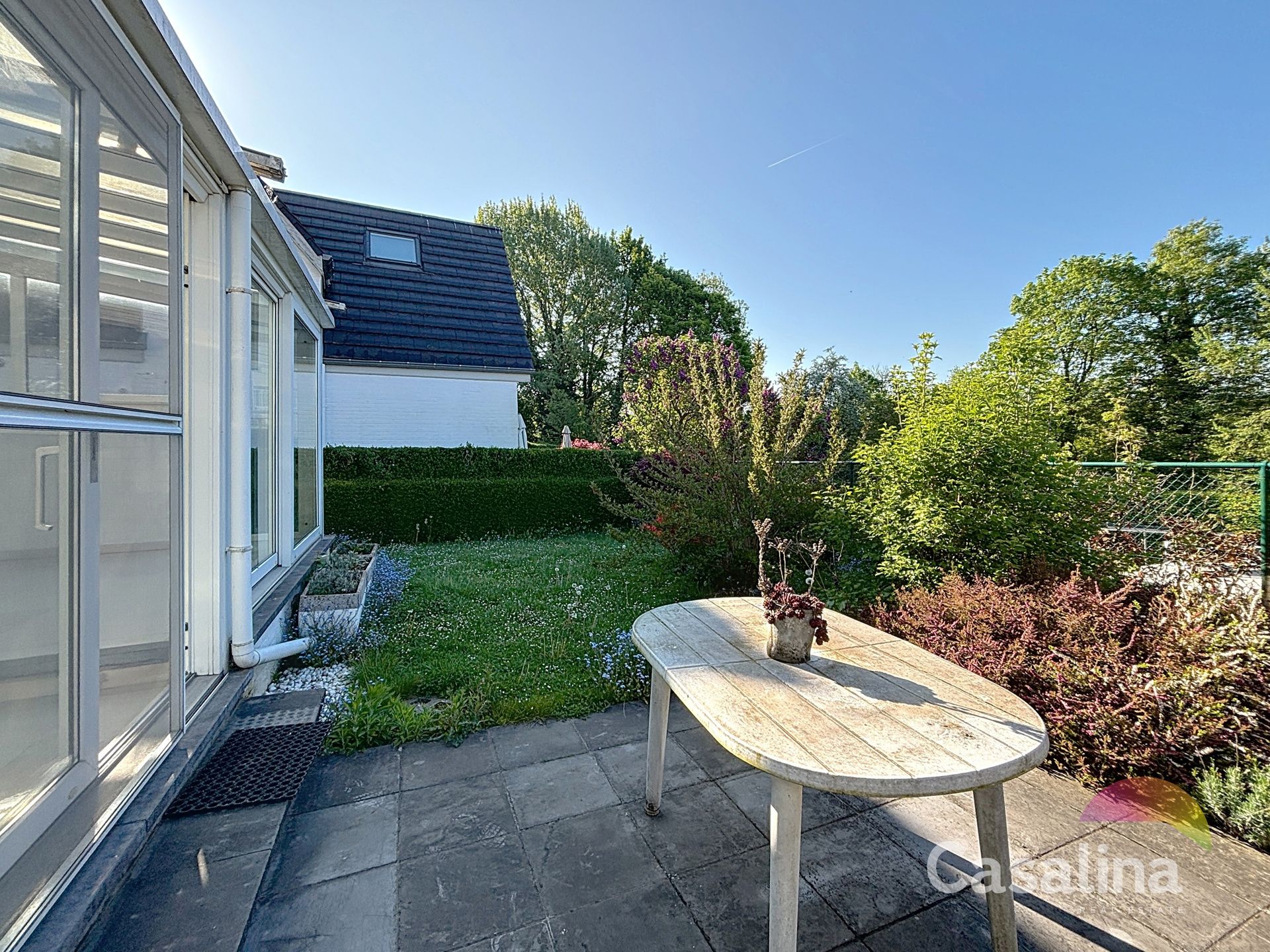 Vier gevel woning met tuin te huur  foto 2