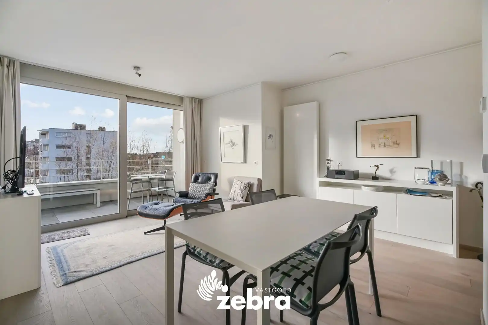 Moderne serviceflat met prachtig zicht op de Leie en autostaanplaats te Deinze! foto 2