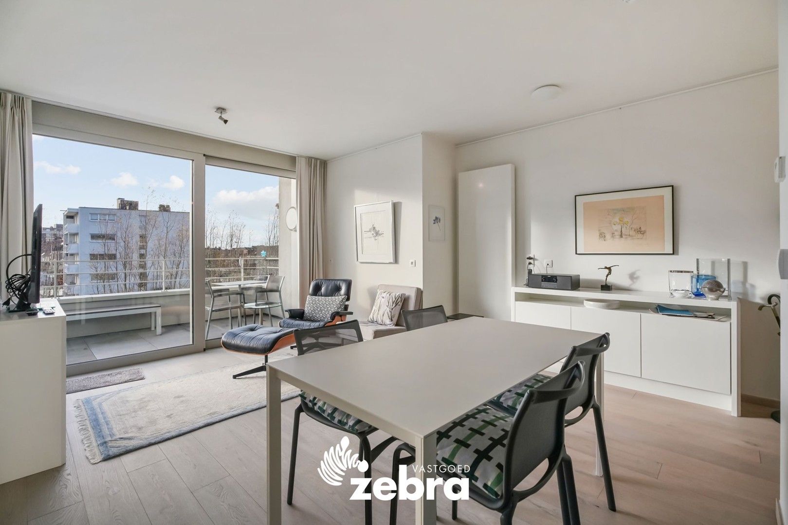 Moderne serviceflat met prachtig zicht op de Leie en autostaanplaats te Deinze! foto 2