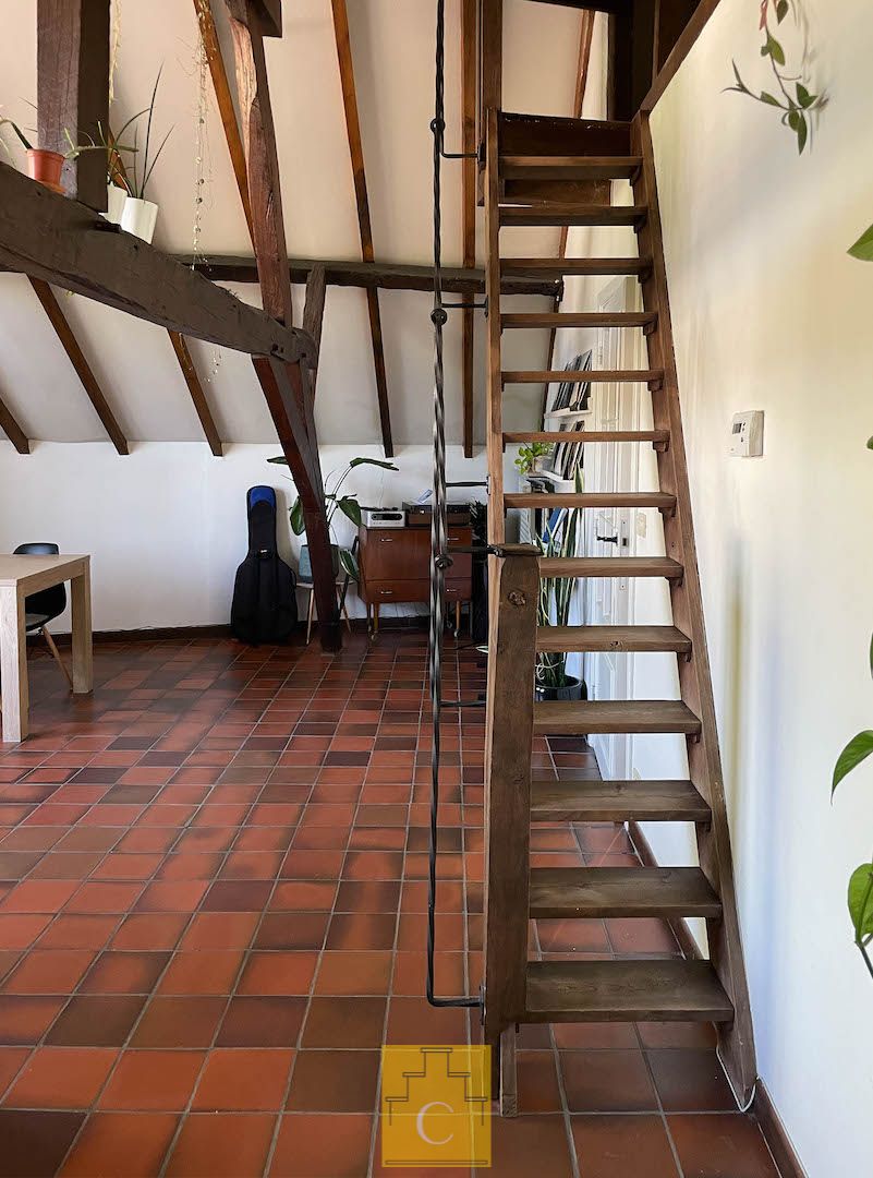 ruim dakappartement in herenhuis aan de Potterierei foto 15