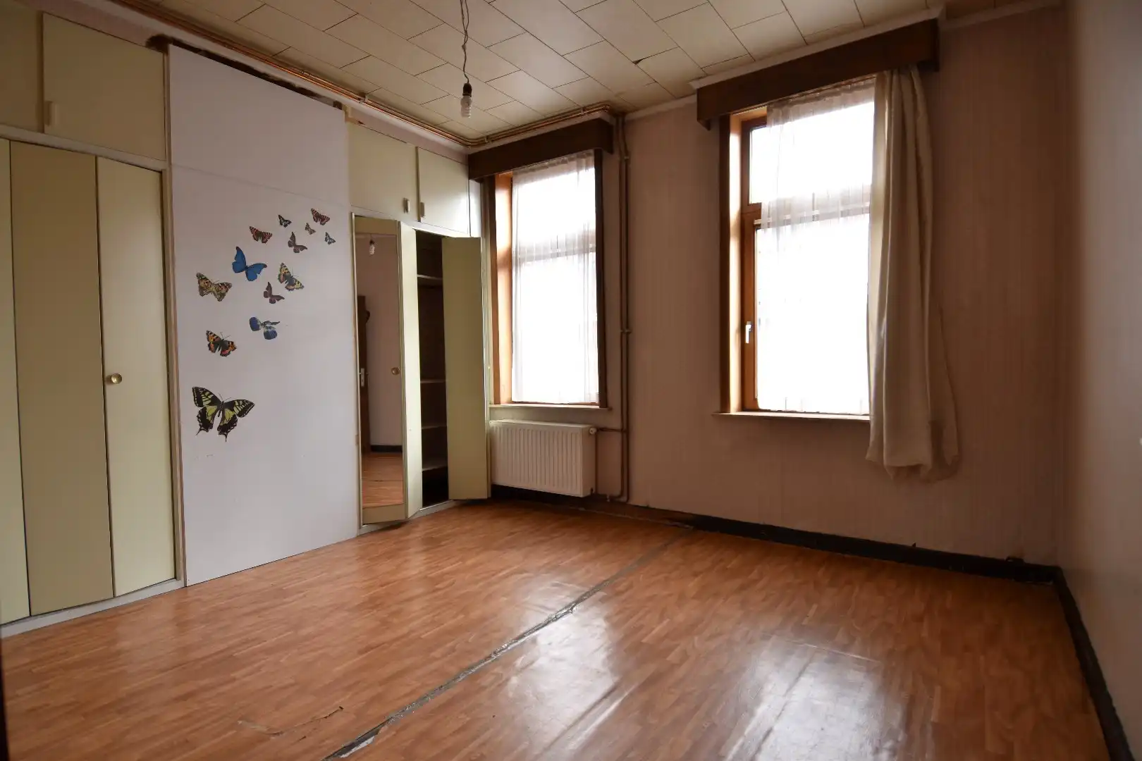 Ruime 3-slaapkamerwoning met bovenliggend appartement (woning) te koop in centrum-Kortrijk foto 6