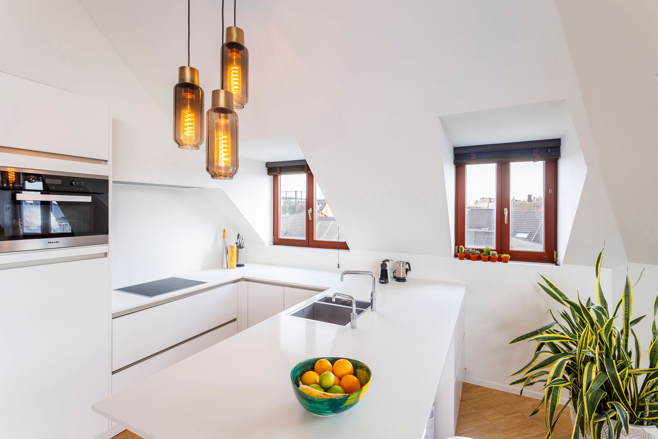 penthouse met riant dakterras aan de Marnixplaats foto 12