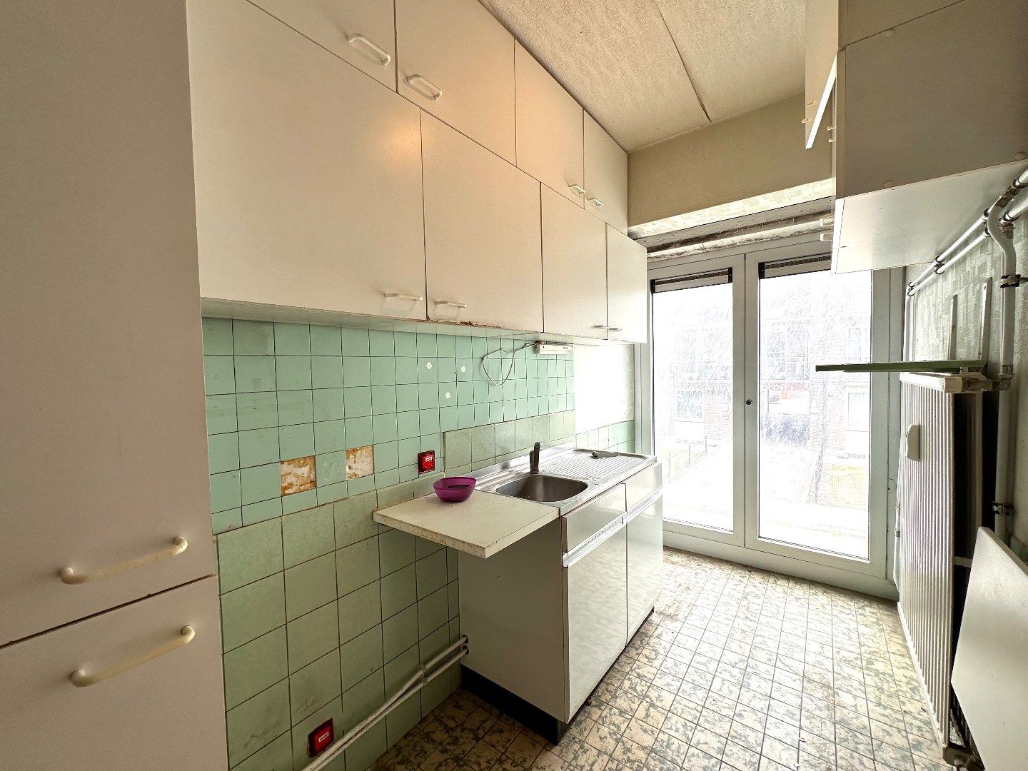 Te renoveren appartement met 2 slaapkamers en terras nabij het centrum van Tongeren foto 5
