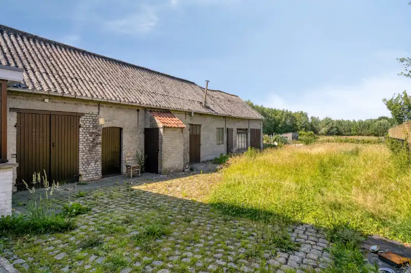 Karaktervolle woning met voormalige schuur en adembenemend uitzicht op de velden foto 11