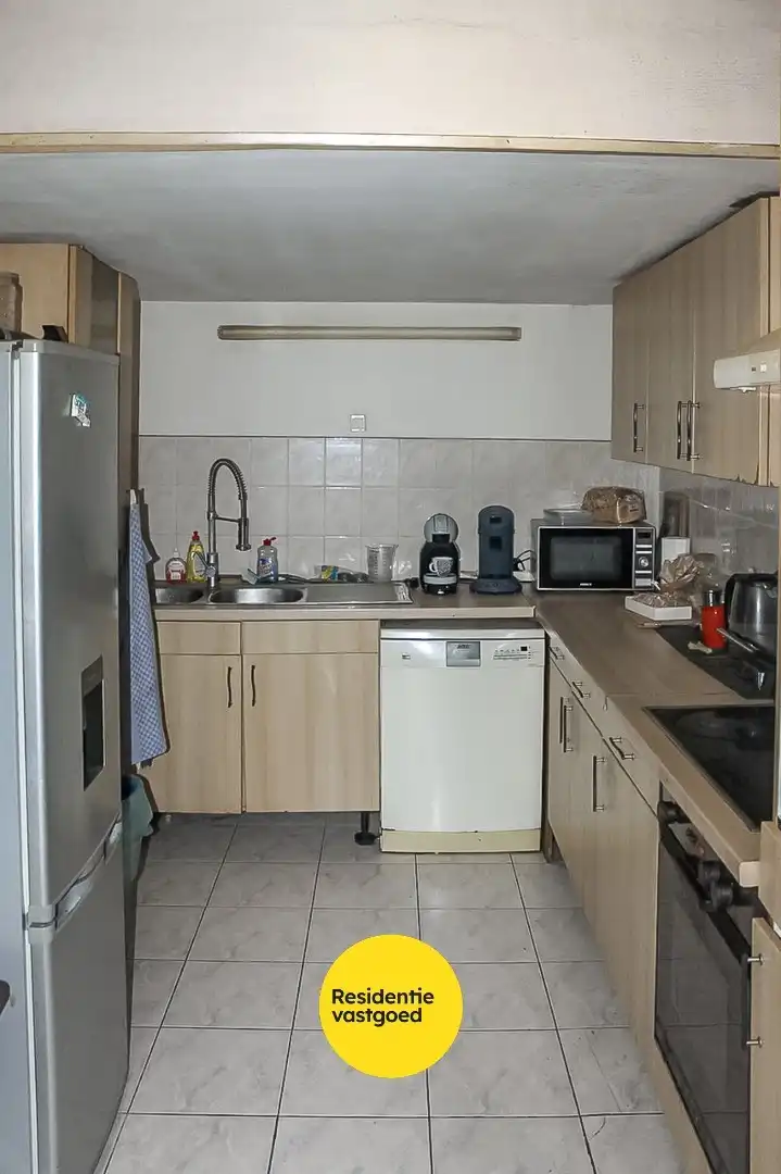 Te renoveren woning met dubbele garage in Bredene – ideaal renovatieproject foto 11