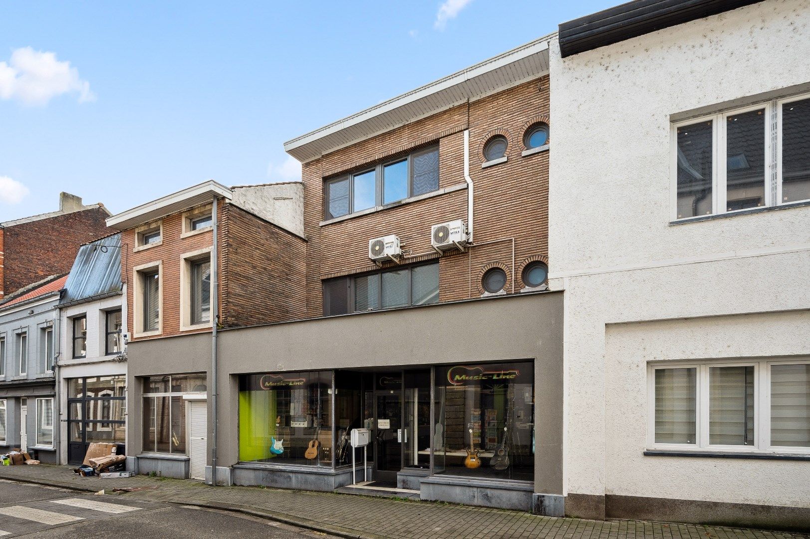 2 gekoppelde woningen met handelsruimte en woonst foto 3