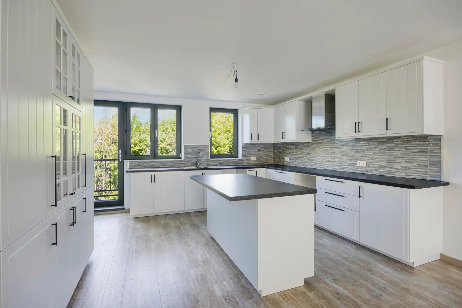 Nieuwbouw triplex met 4 slaap- en badkamers, tuin en parking foto 6
