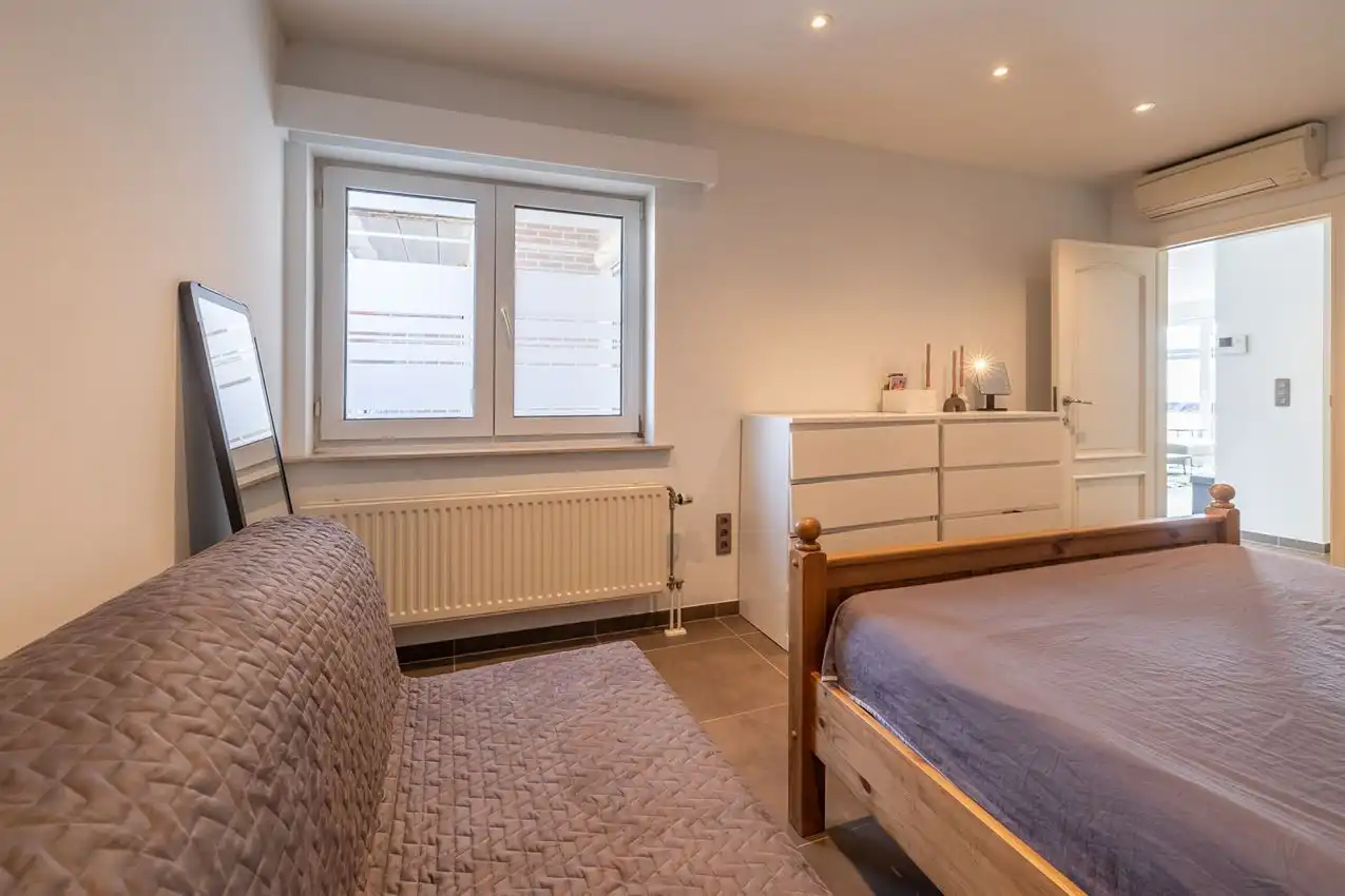 Appartement met twee slaapkamers, terras en autostaanplaats te midden van centrum foto 17