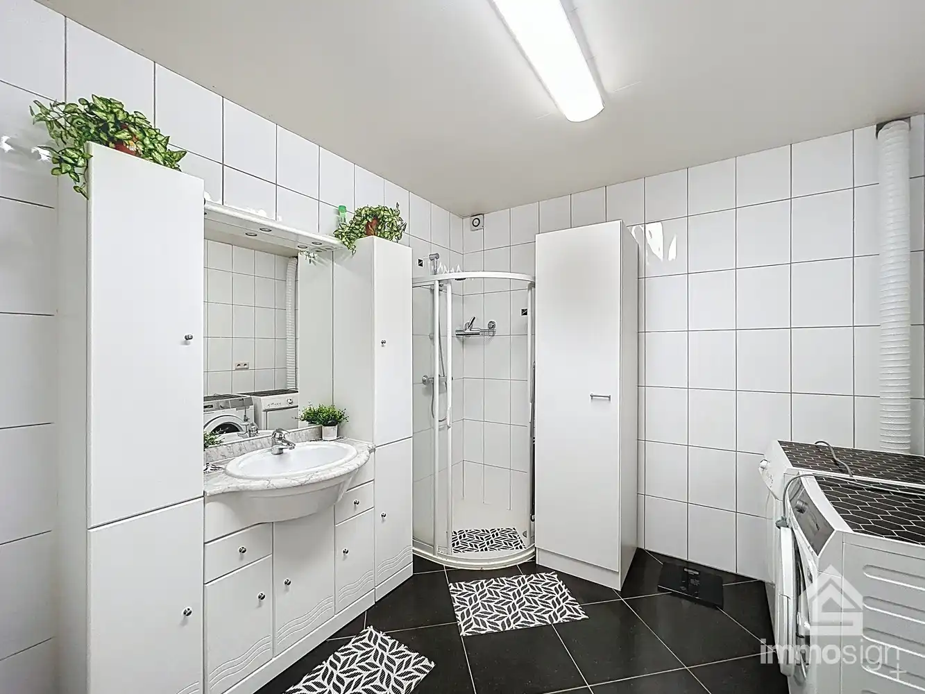 Appartementsgebouw met gelijkvloers- en duplexappartement in Peer centrum! foto 17