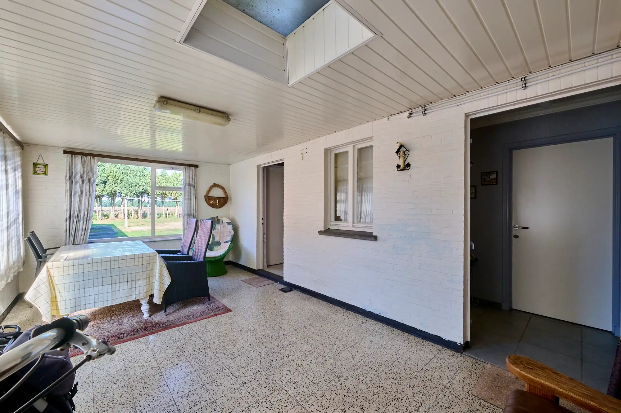 Rustig gelegen te renoveren woning op perceel van 10a50ca foto 7