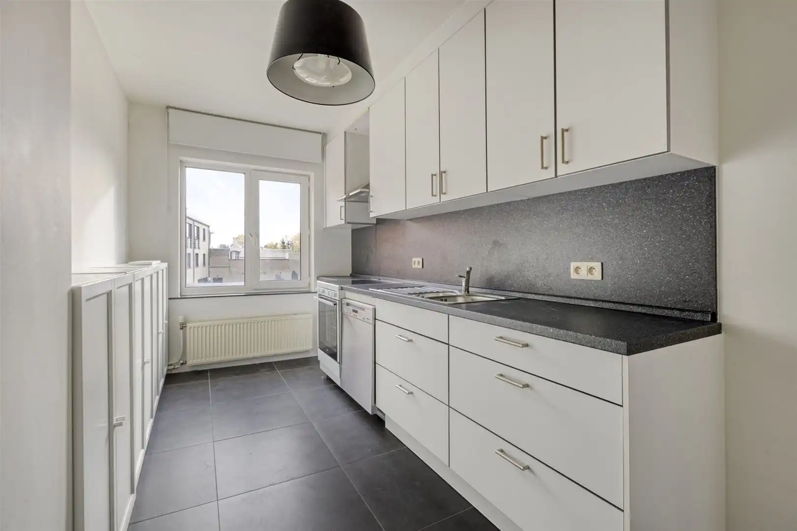 TE KOOP: Duplex-appartement (3slpks) met kantoorruimte of handelsruimte op topligging in Genk! foto 7