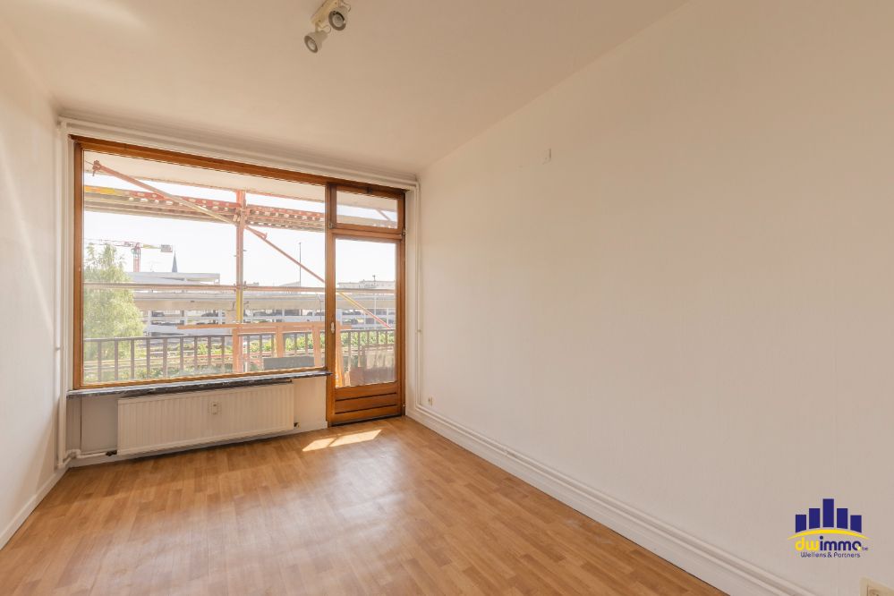 Te koop: Licht en ruim 2-slaapkamerappartement met terras en garage – E3-plein 22, Gent foto 4