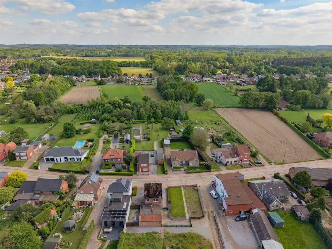 Karaktervolle woning met grote tuin, bijgebouwen en uitbreidbaar zoldervolume op een verrassend diep perceel foto 39
