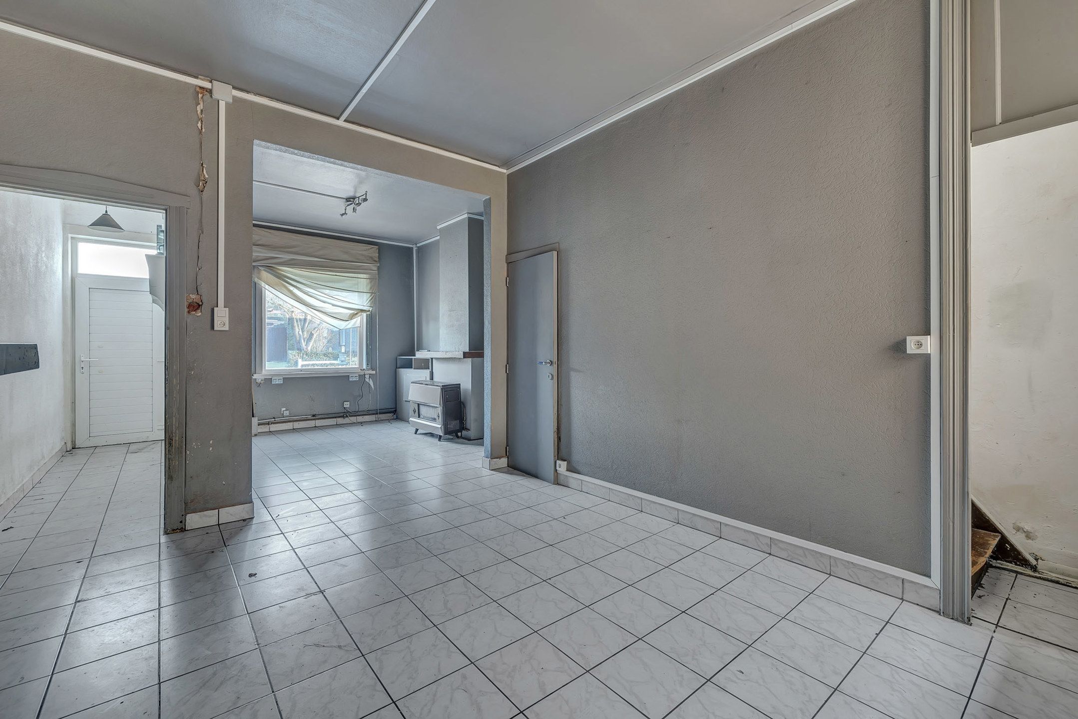 Te renoveren woning met centrale ligging in Astene/Deinze foto 4