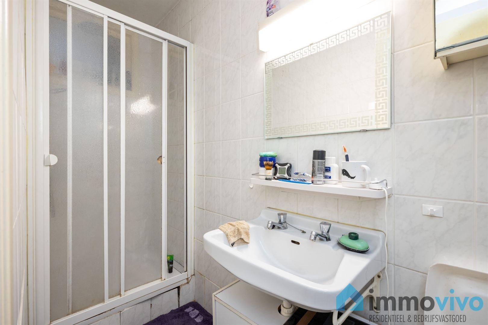 Ruim gelijkvloersappartement met 3 slpk's en koer foto 12