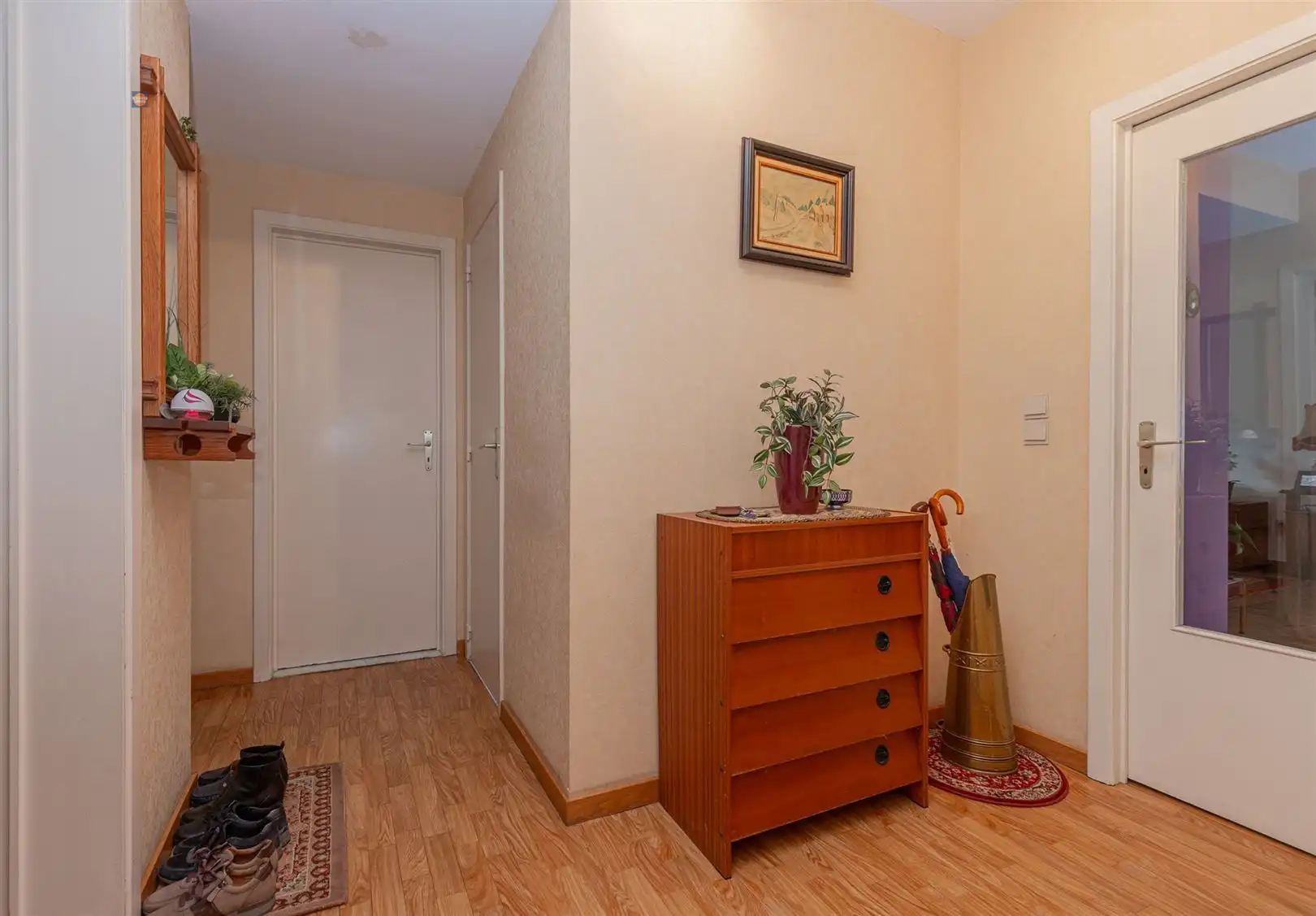 Gelijkvloers 2-slaapkamerappartement met tuin en garage foto 11