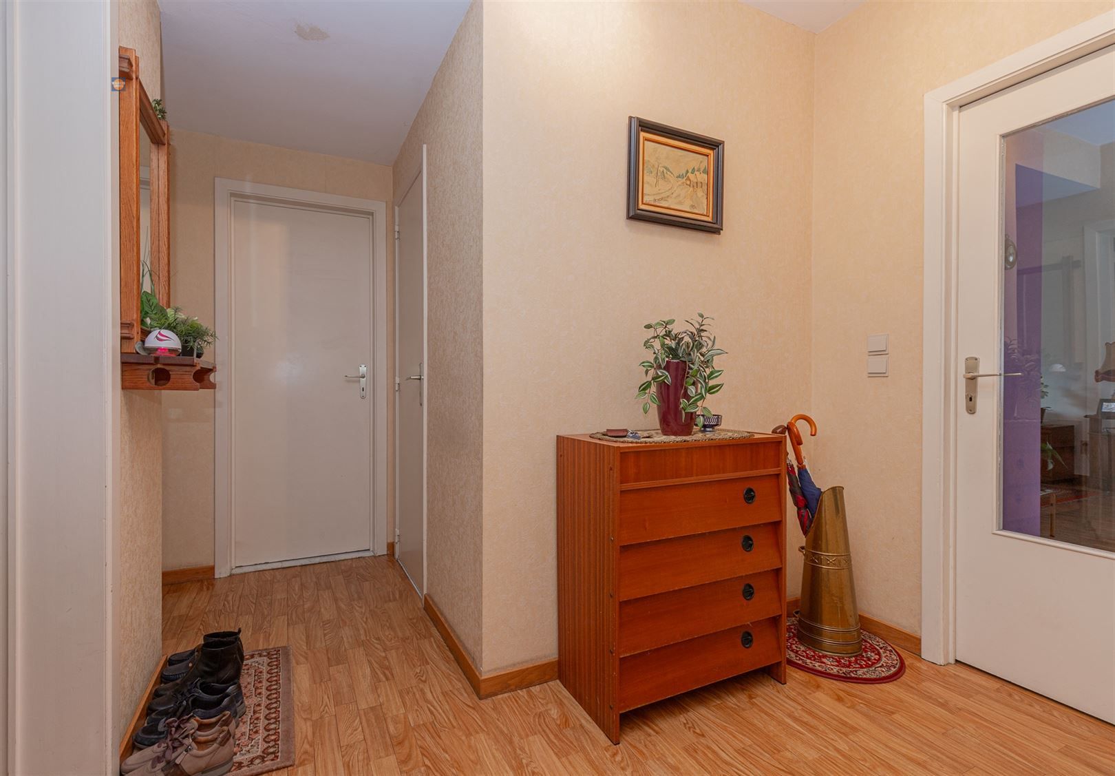 Gelijkvloers 2-slaapkamerappartement met tuin en garage foto 11