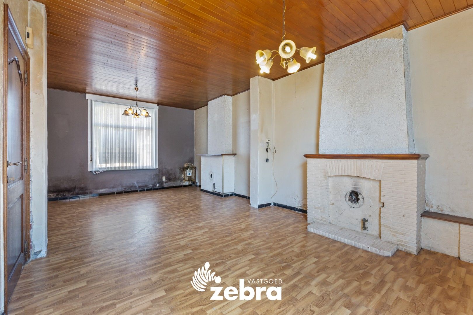 Te renoveren woning met stadskoer in centrum Tielt! foto 3