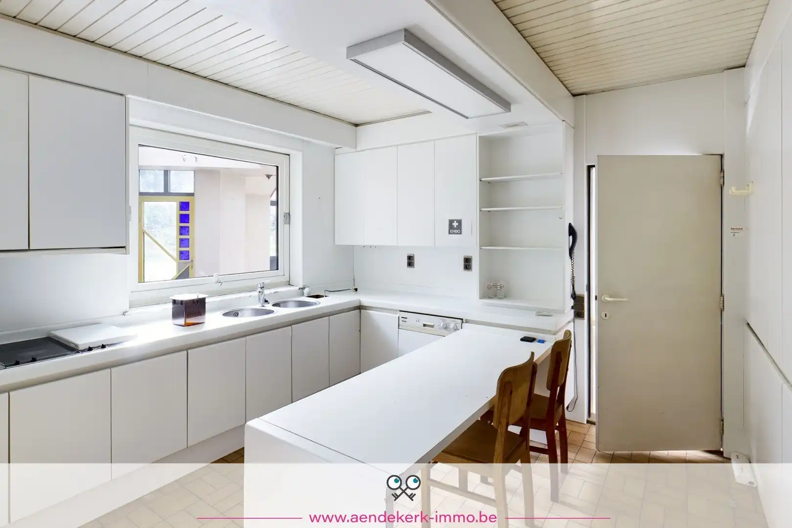 Woning met handelsruimte in het centrum van Kinrooi foto 17