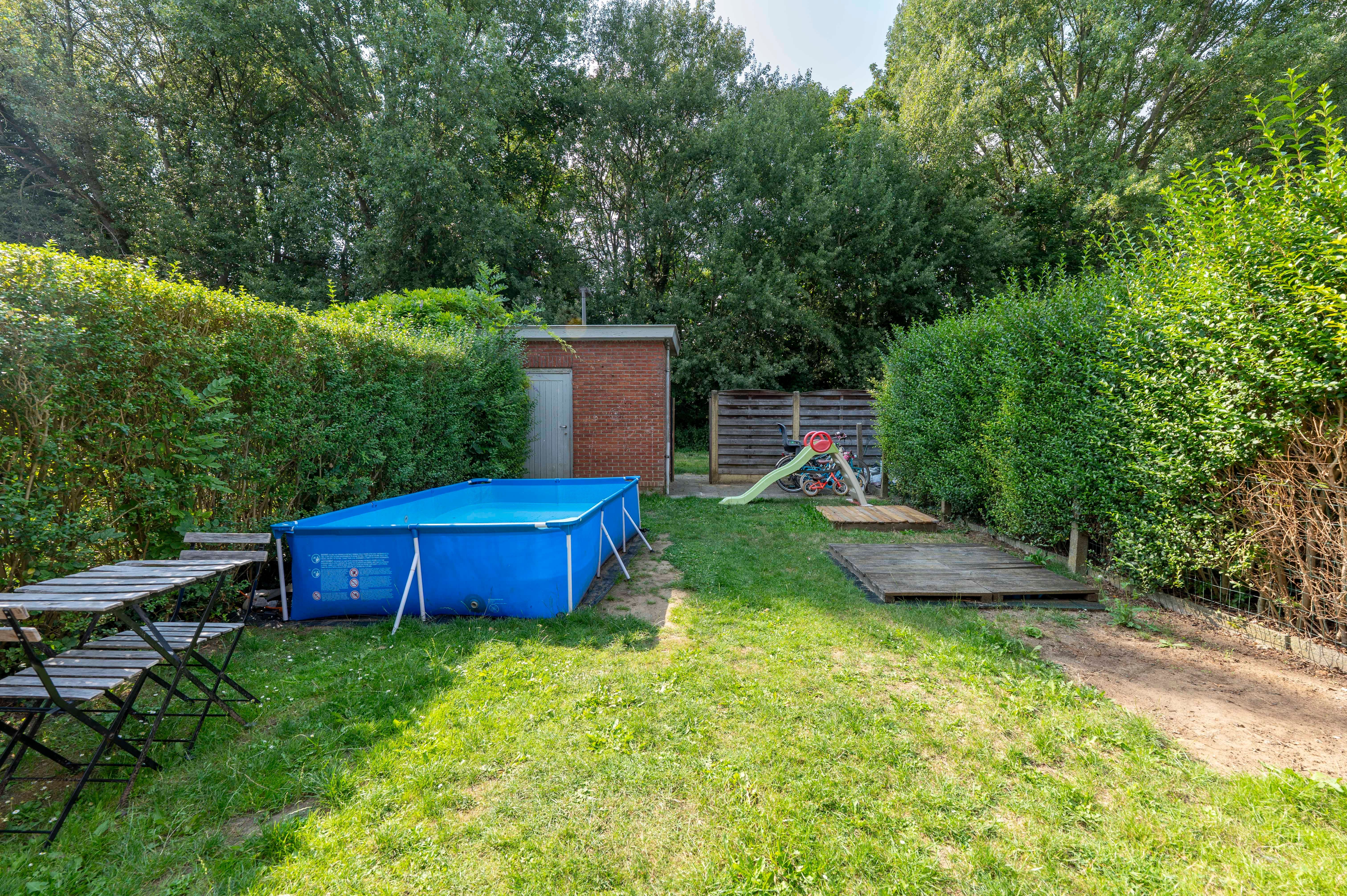 Instapklare gezinswoning met tuin en achteringang op centrale locatie in Ekeren! foto 16