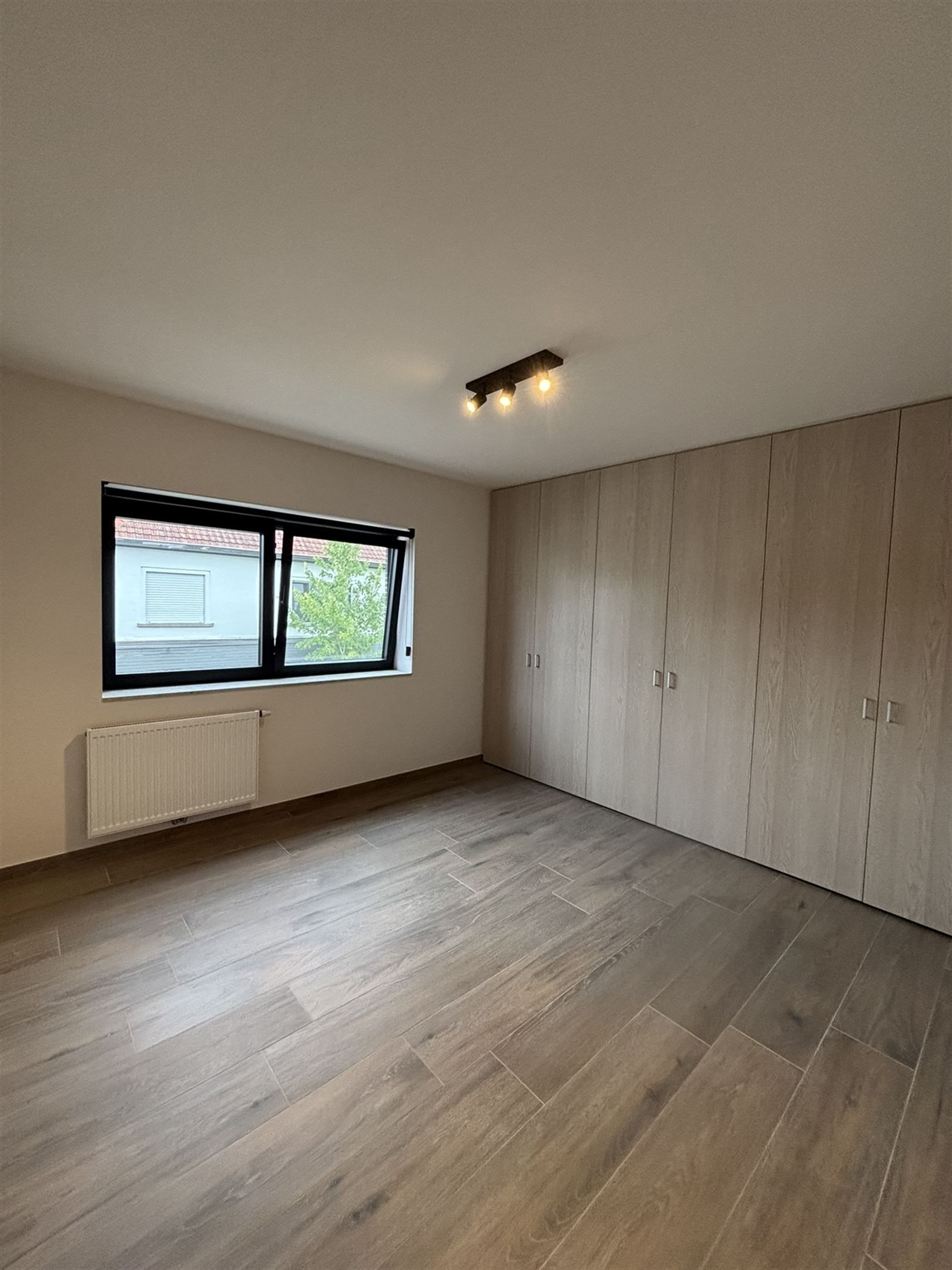 Stadswoning met 3 slaapkamers en carport foto 10