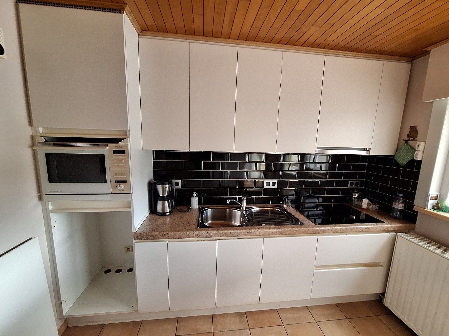 Halfopen woning met grote tuin in een rustige buurt foto 10