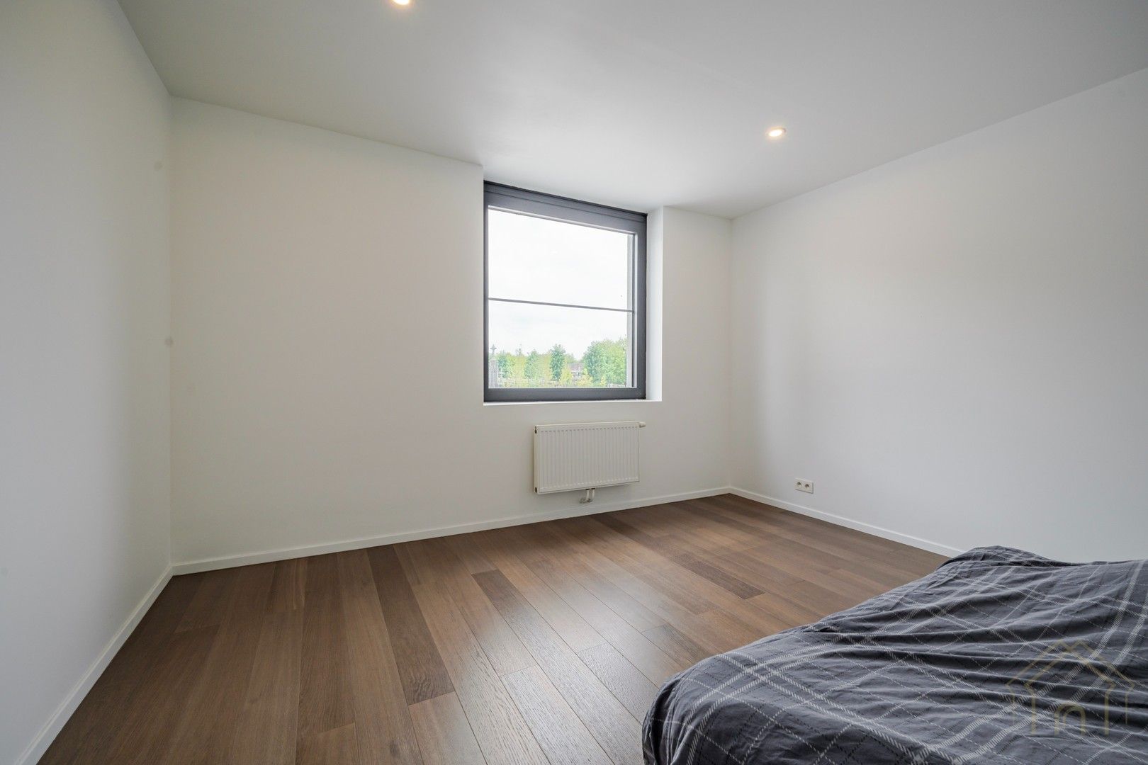 Instapklare, energiezuinige woning met grote tuin in hartje Menen foto 6