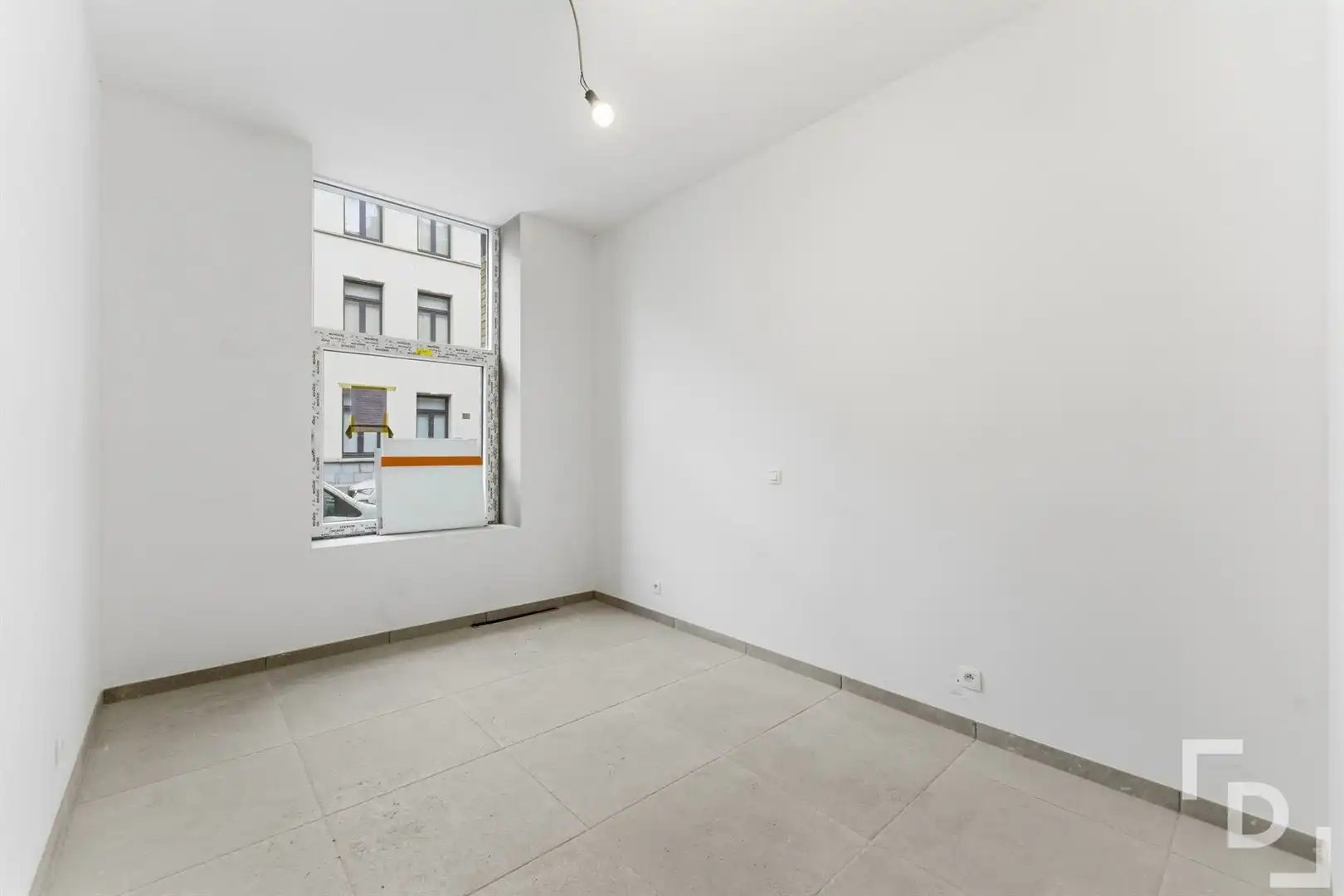 Nieuwbouwappartement met terras en tuin te koop in centrum Ieper. foto 9