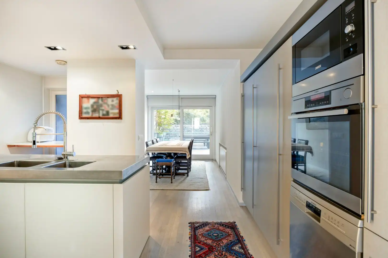 Gelijkvloers appartement met een terras van 50m²,  3 slaapkamers en staanplaats in het centrum van Leuven! - bewoonbare opp. 147m²  foto 11