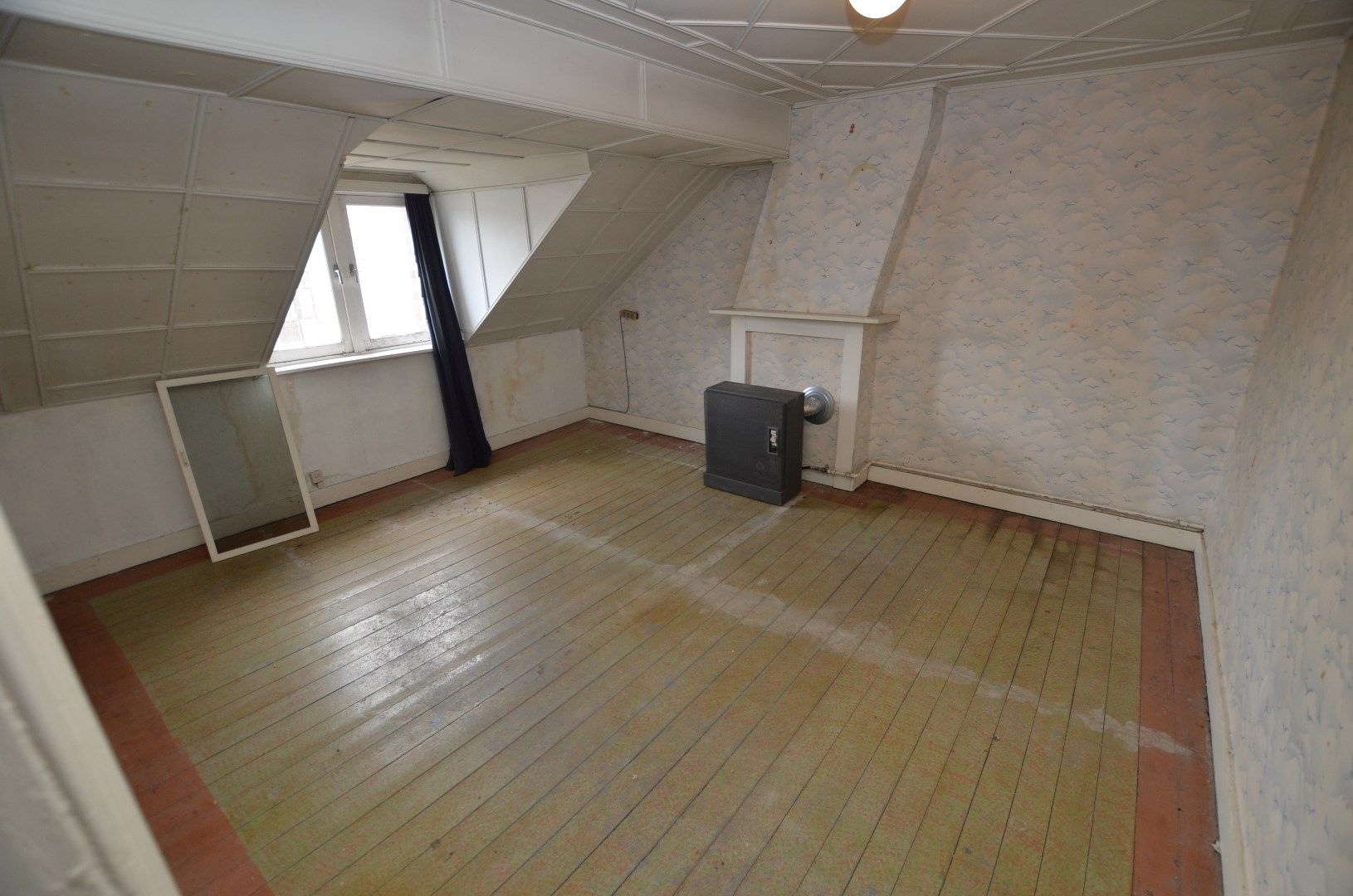 Te renoveren karaktervolle ruime woning met zonnige tuin foto 10