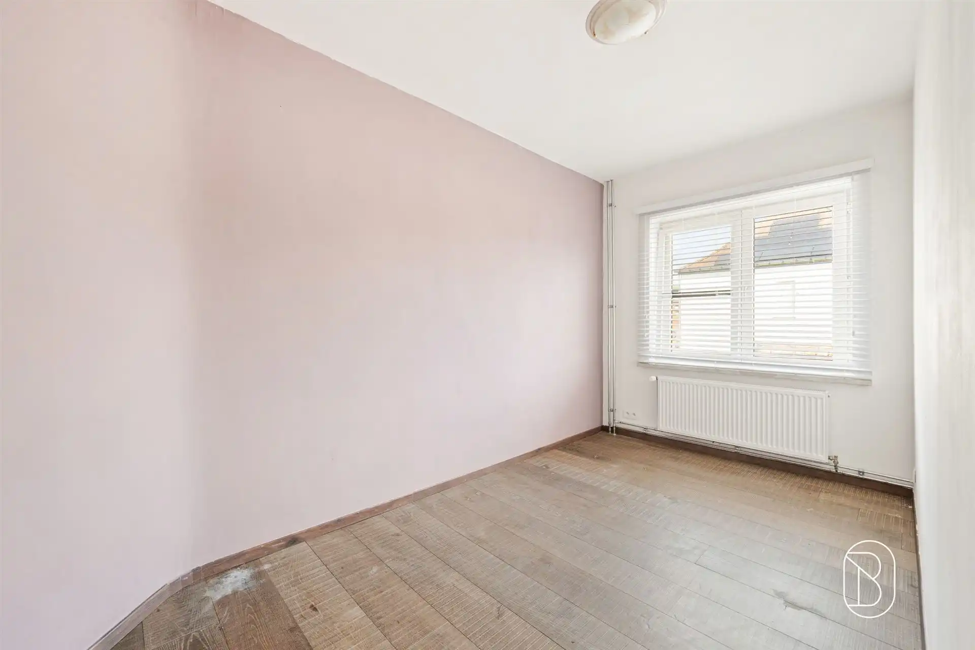 Gezellige instapklare woning met 3 slpk, koer en tuintje foto 15