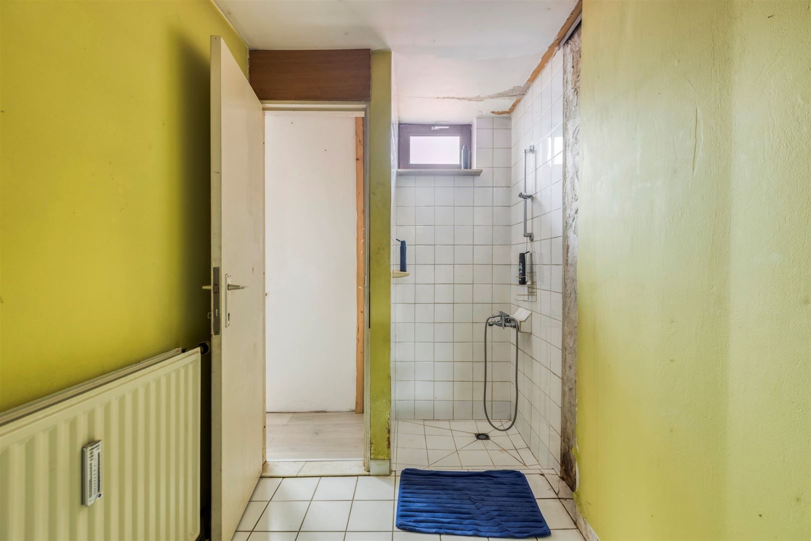 Te renoveren gelijkvloers appartement foto 14