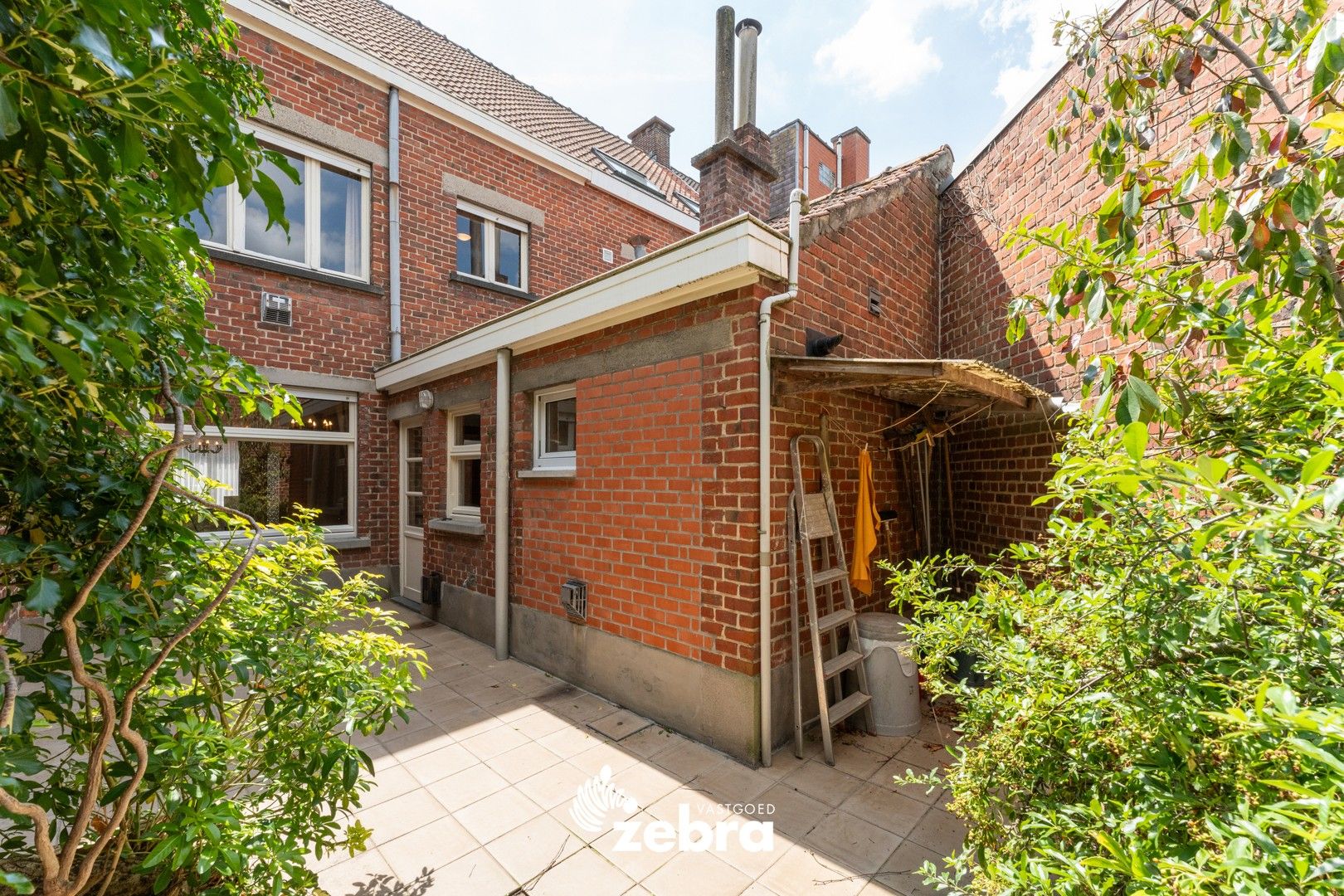 Te renoveren woning met gezellige stadskoer & 5 kamers te centrum Roeselare! foto 10