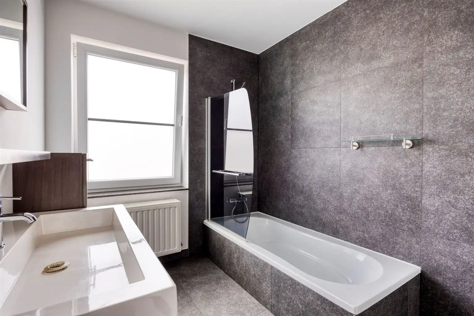 Instapklaar gelijkvloers appartement met 2 slaapkamers, ruime tuin en parkeergelegenheid op een rustige toplocatie in Opitter.  foto 18