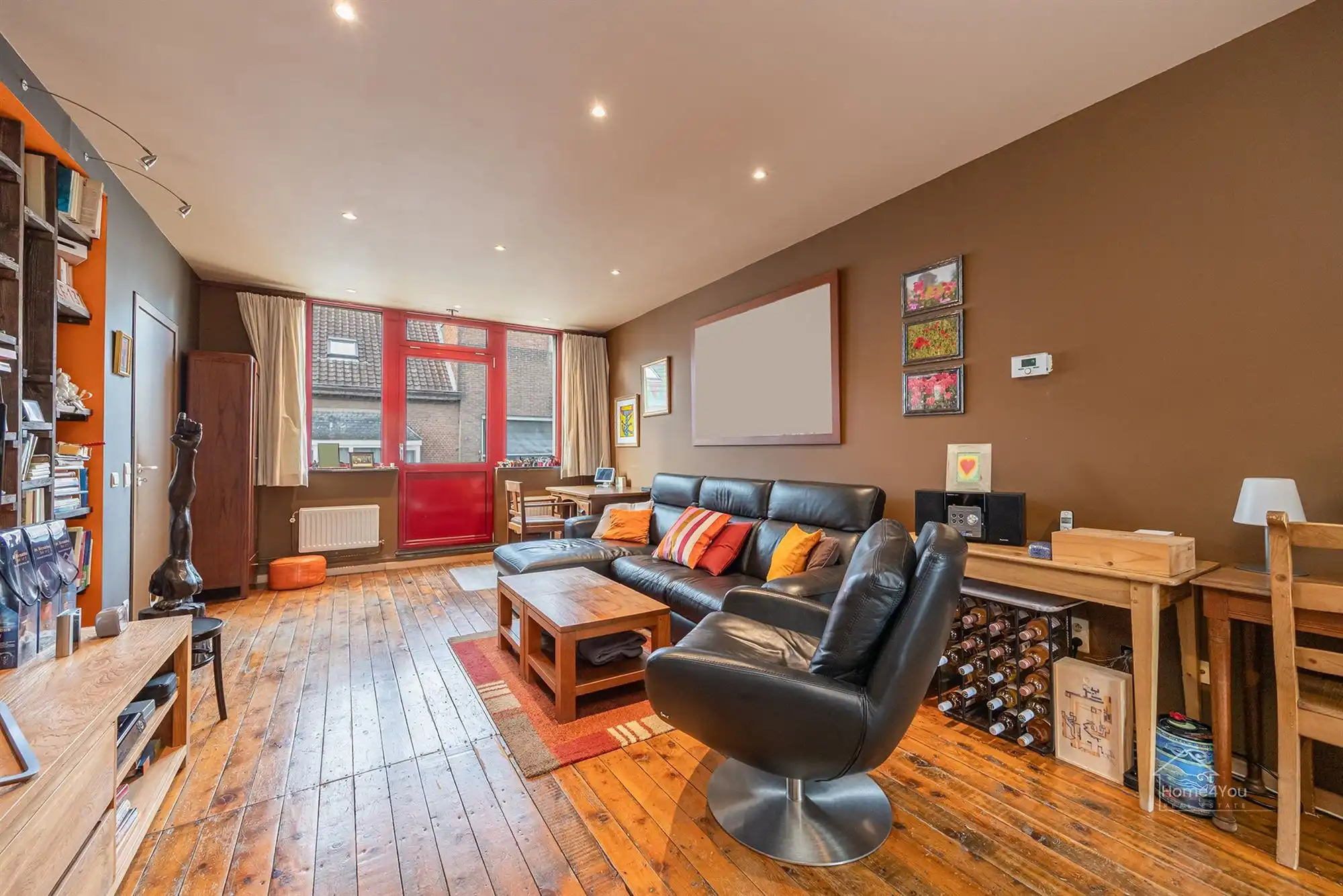 Veelzijdig handelshuis met ruim duplex appartement foto 3