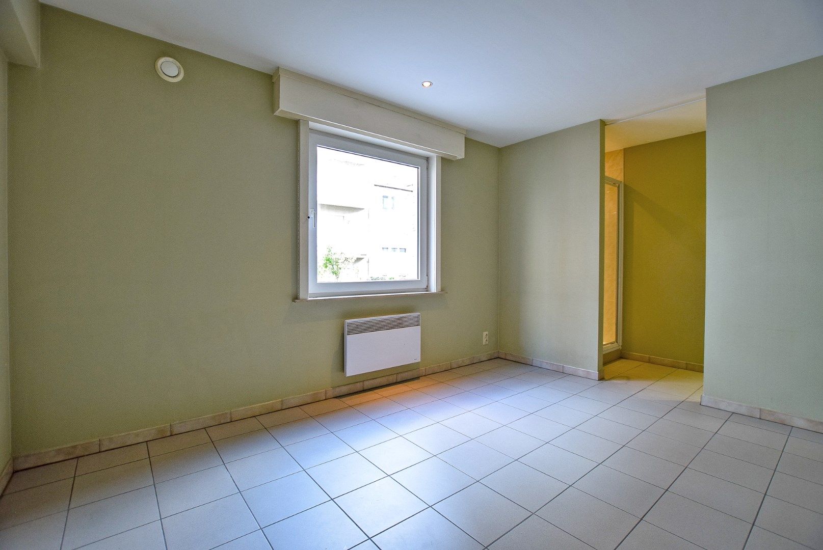 Goed gelegen 2-slaapkamerappartement te Oostduinkerke-Bad vlakbij de winkelstraat en het strand.  foto 9