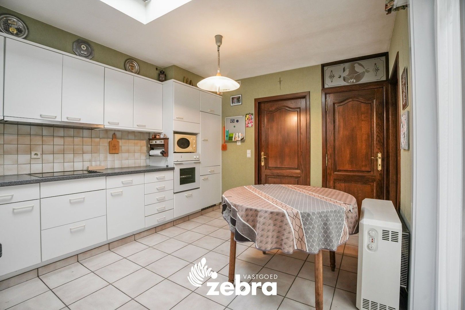 Ruime gezinswoning met 4 slaapkamers, tuin en garage in hartje Tielt foto 6