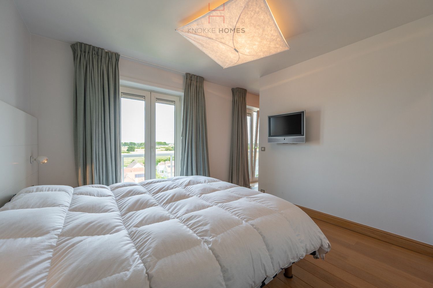 Riant appartement met open zicht over het meer van Duinbergen foto 12