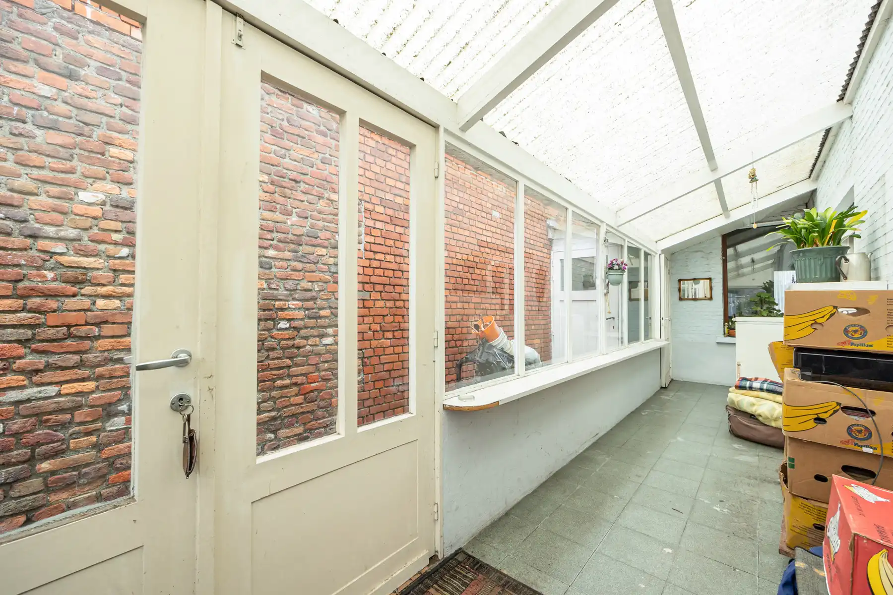 Totaal te renoveren EGW met 2 slpk, diepe tuin en fietsgang foto 10