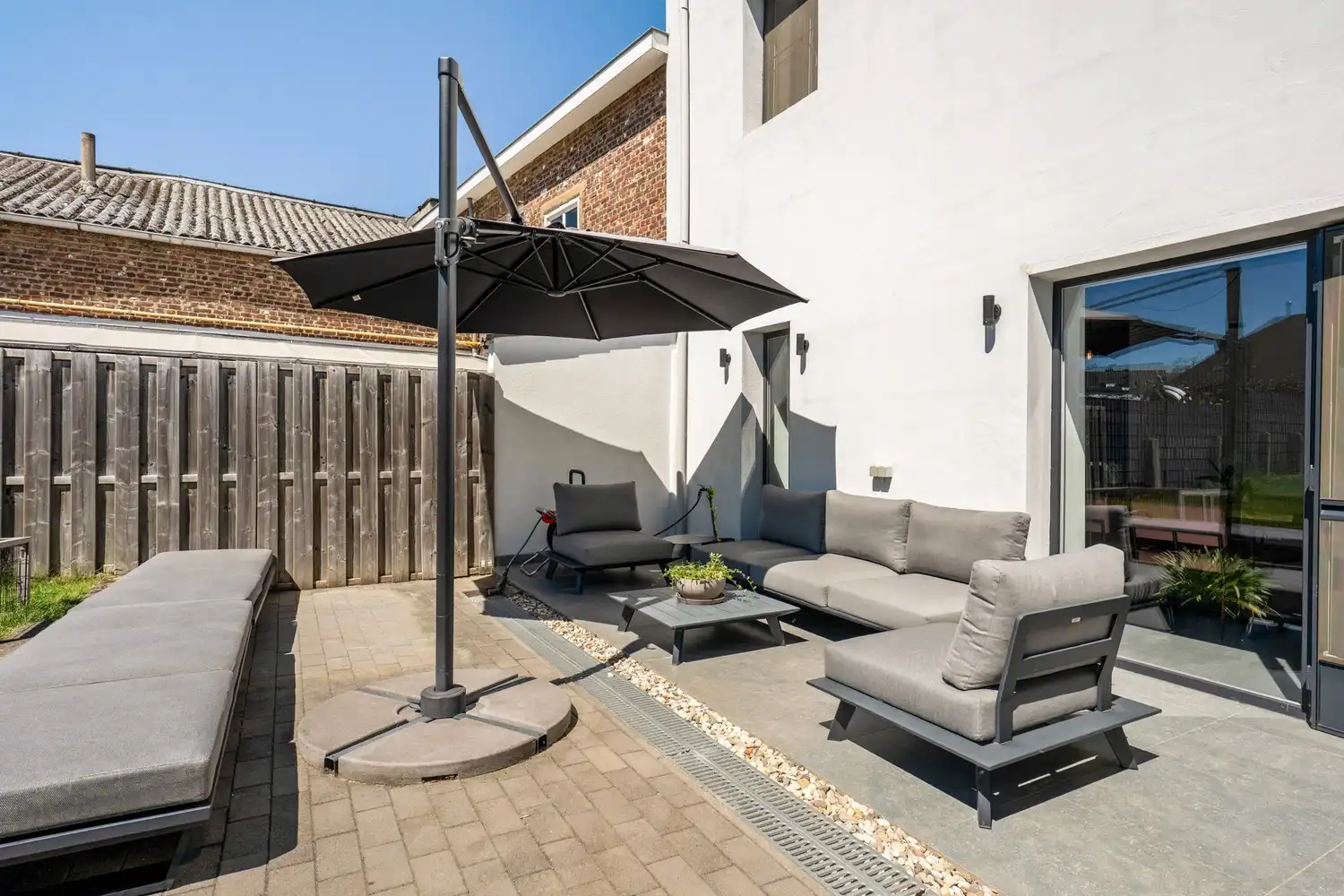 Instapklare woning met 4 slpkrs met gezellig terras en tuin foto 16