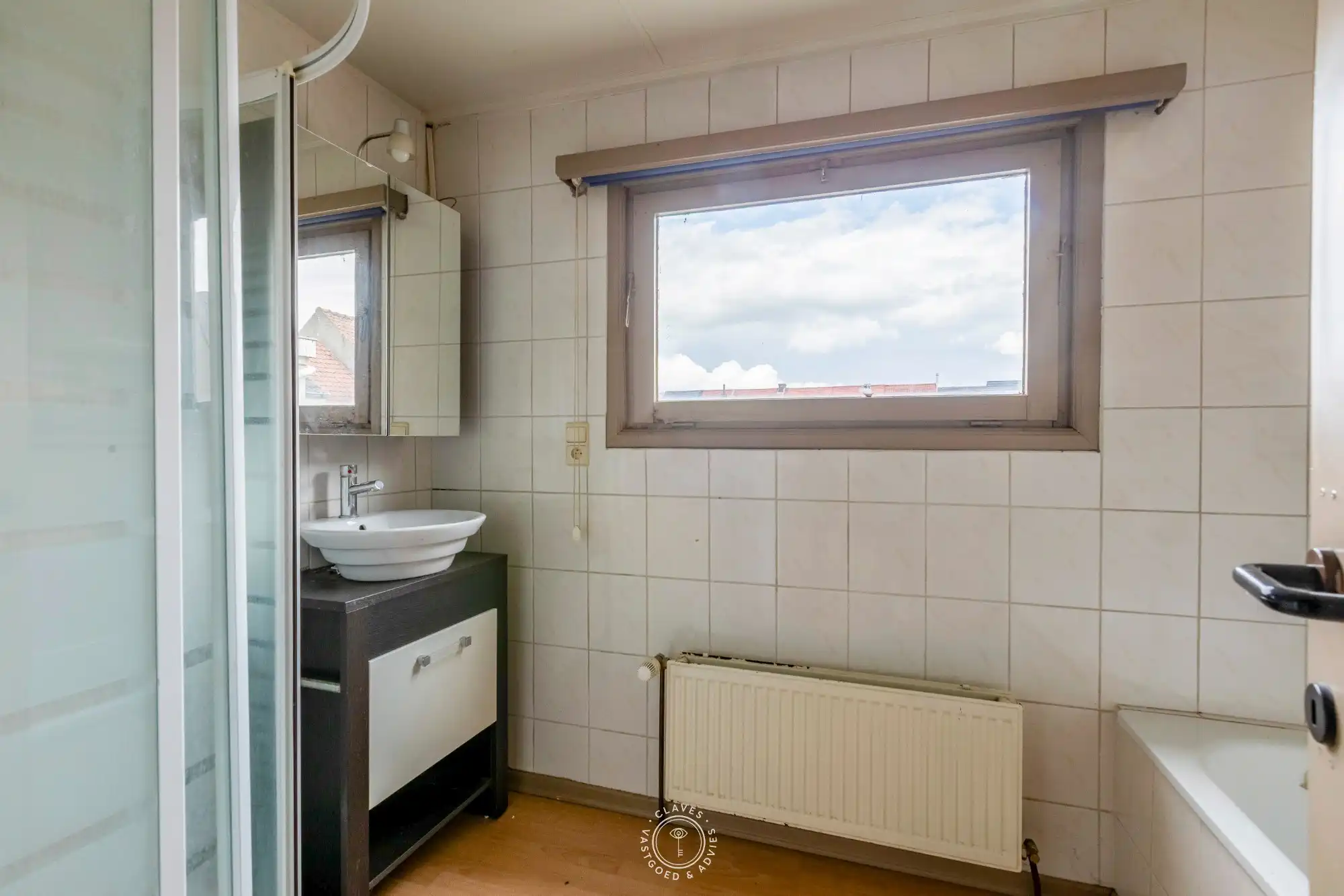 Karaktervol handelspand met woonst op topligging tegenover kerkplein foto 10