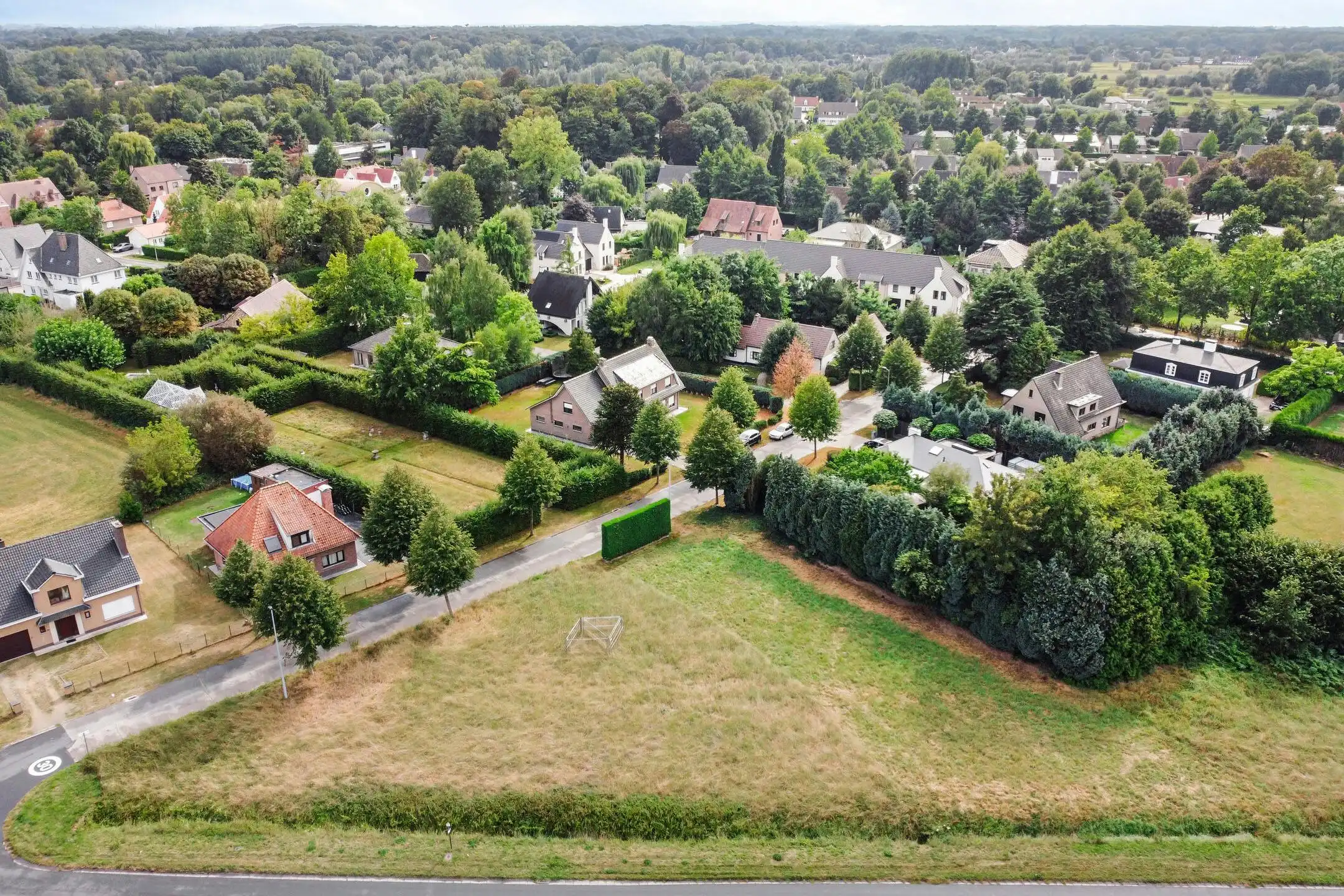 Perceel bouwgrond voor open bebouwing te koop in Drongen foto {{pictureIndex}}