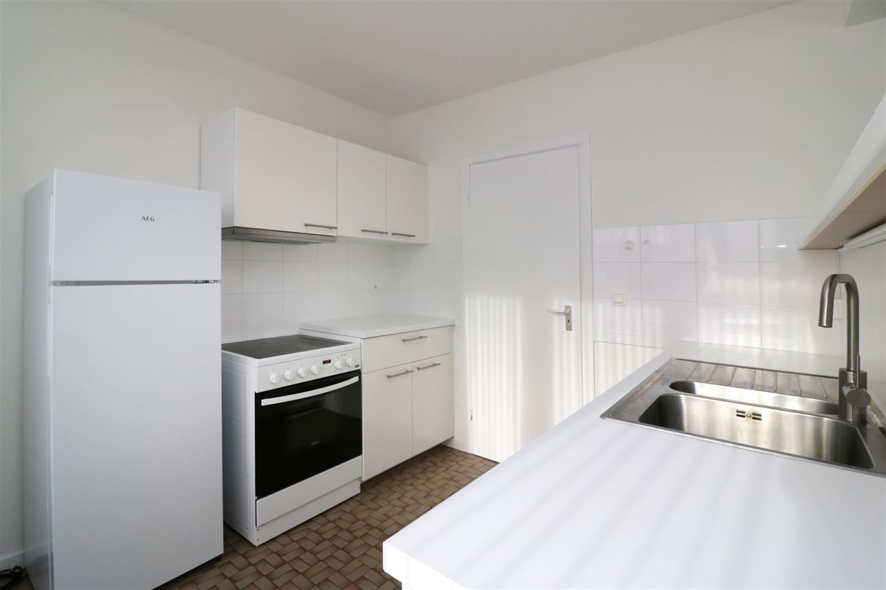 Centraal gelegen app met 2 slpk.en garagebox foto 7